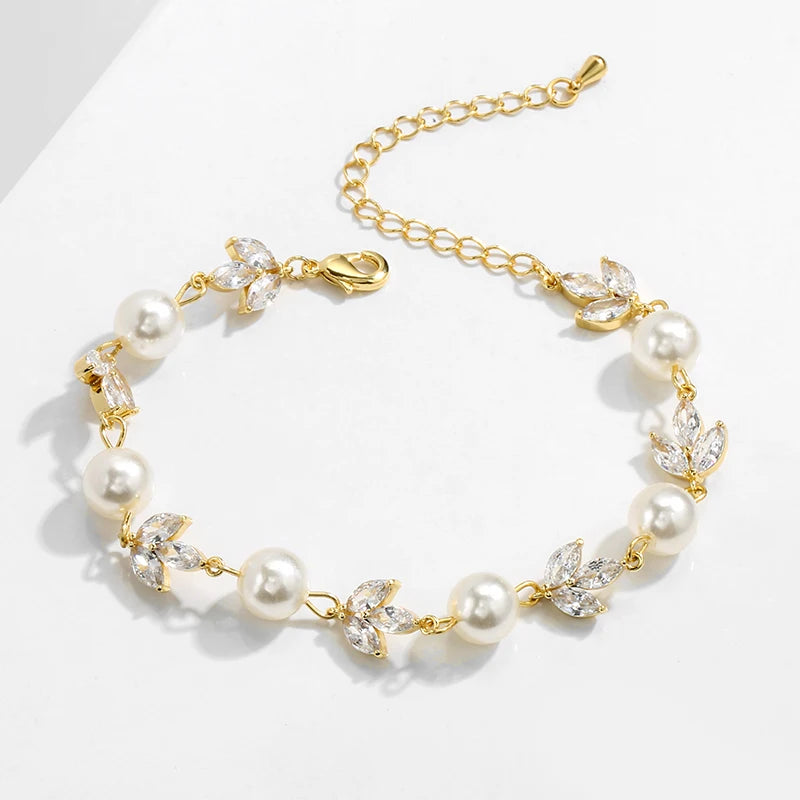 Yellow Gold Pearl and Diamond Bracelets