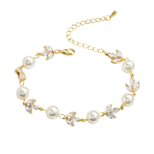 Yellow Gold Pearl and Diamond Bracelets